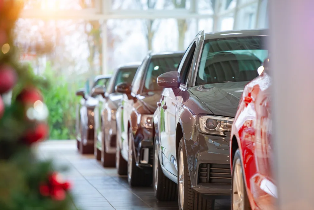 cars waiting for pick up at car dealer